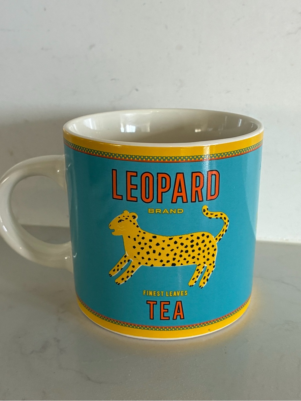 Leopard Brand Tea Ceramic Mug - Turquoise & Yellow from Rex London